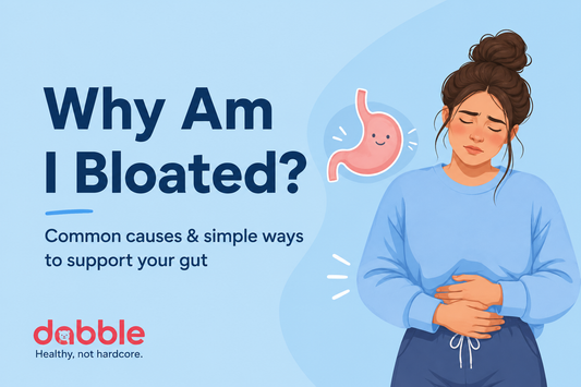 Woman holding her stomach with the headline "Why Am I Bloated?" on a blue background.